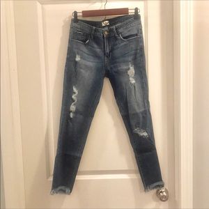 Mid Rise Distressed Jeans - Just Black Denim